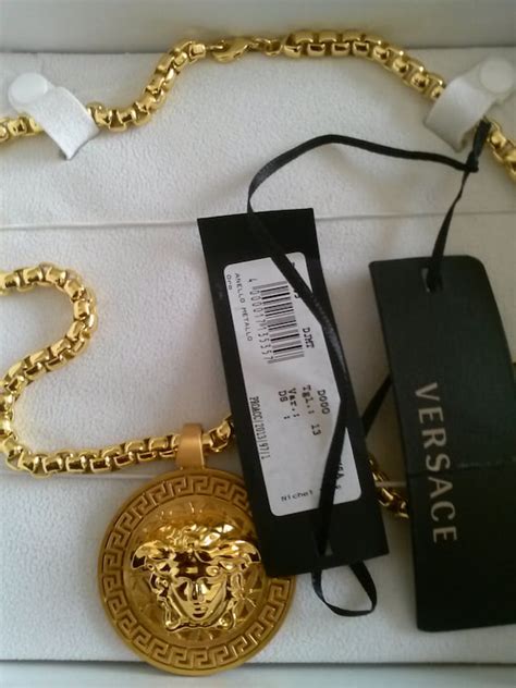 real gold versace chain|Versace gold chain dress.